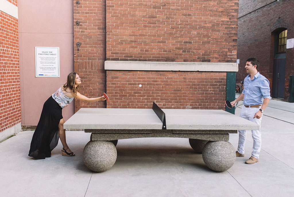 couple playing games engagement photos - Toronto engagement photographer Olive Photography