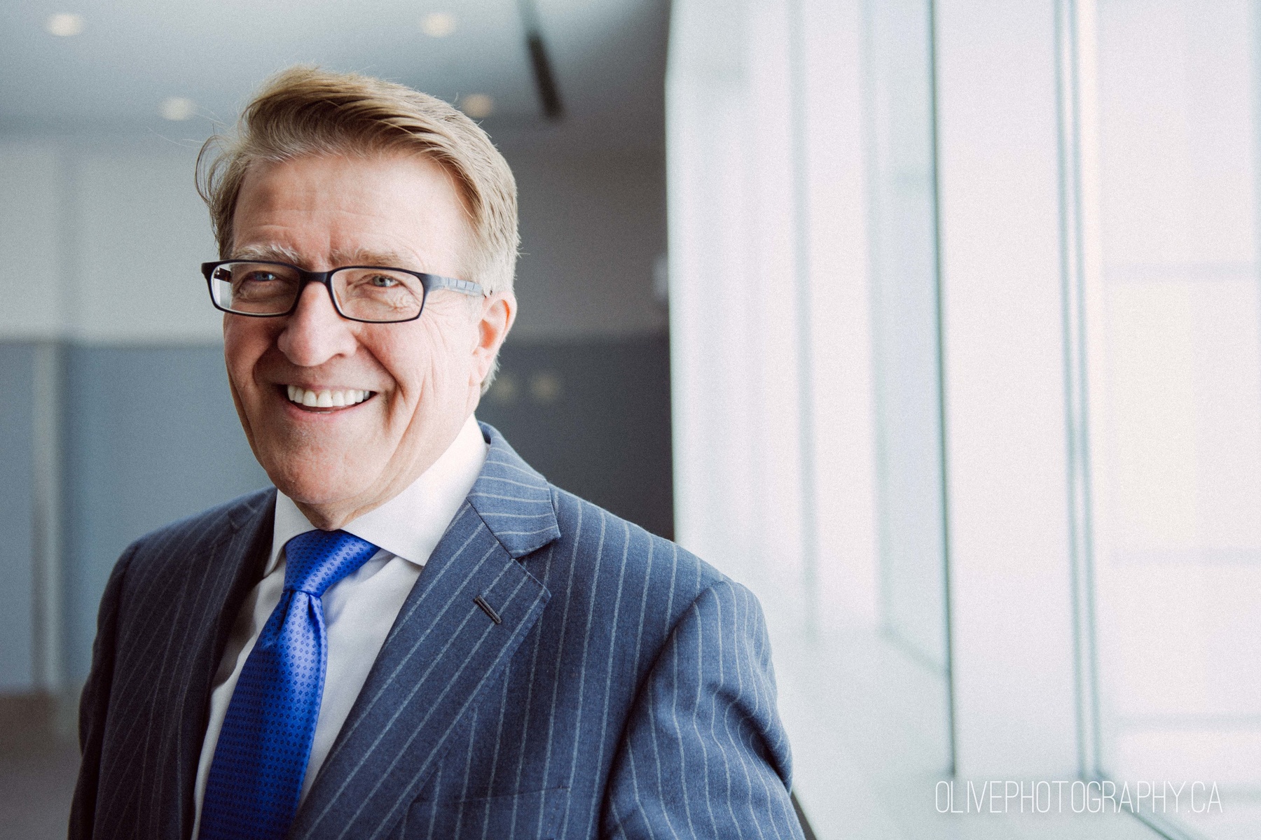 Warm corporate portrait photography Toronto | Robert Deluce of Porter Airlines by Olive Photography